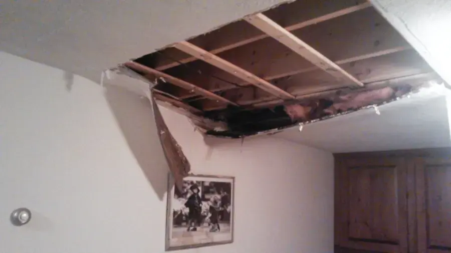 Ceiling opened to dry the framing after water came through from above